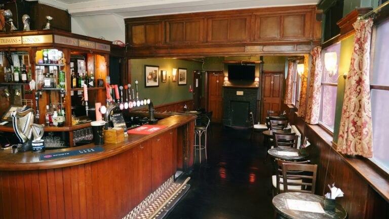 Traditional wood-panelled bar at The Stag’s Head, Hoxton