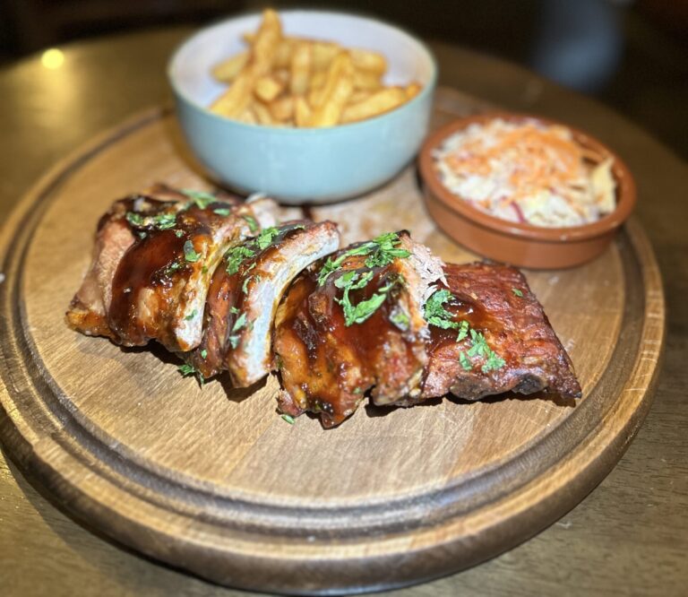 Sticky ribs with fries and slaw at The Stag’s Head