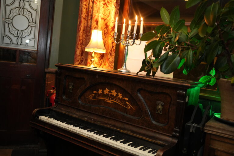 Candlelit piano in the bar at The Stag’s Head, Hoxton